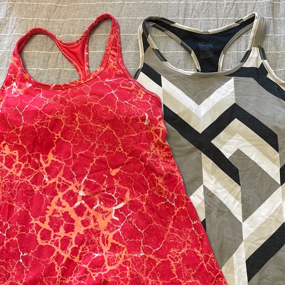 Pair of Nike workout tanks.